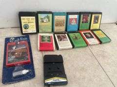 Quantity of 8 track tapes including cassette to 8 track adapter, head cleaner, Christmas music etc.