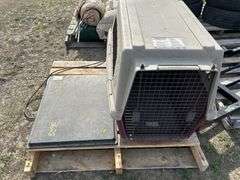 Large pet kennel and a heating mat