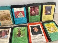 Quantity of 8 track tapes including cassette to 8 track adapter, head cleaner, Christmas music etc.