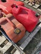 Pallet with gas cans, hockey sticks etc.
