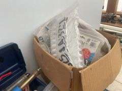Large quantity of ear tags  and installer pliers, vaccination syringes