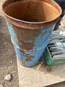 Pallet with 2 steel barrels with drains and milk crate of metal shelving dividers
