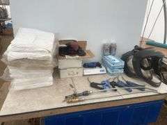 Quantity of L and XL painters coveralls, 2 boxes of nitro gloves, Loctite LB808, miscellaneous face 