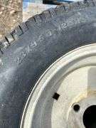 2 yard tractor tires and rims  - 23x9.50-12NHS  Cub Cadet