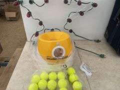 2' Christmas star, ball launcher and some balls, 26" high garment bag on wheels