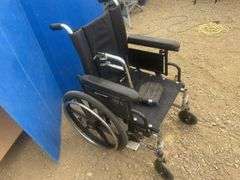 Kid size wheelchair only has one foot rest