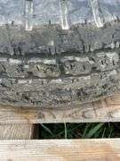 1 trailer tire on steel wheel - ST225/75D-15