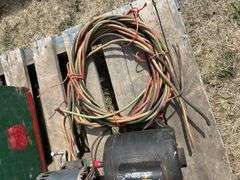 pallet with grease guns, power tools, bbq burner, electric motors