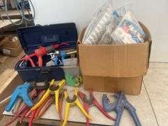 Large quantity of ear tags  and installer pliers, vaccination syringes