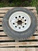 1 trailer tire on steel wheel - ST225/75D-15