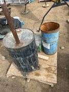 Pallet with 2 steel barrels with drains and milk crate of metal shelving dividers