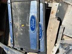 Pallet with mud flaps with battery box, booster cables, ball reciever, propane tank etc.