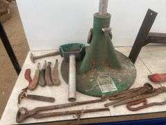 Saddle stand for wall mount, hoof jack, quantity of shoeing tools