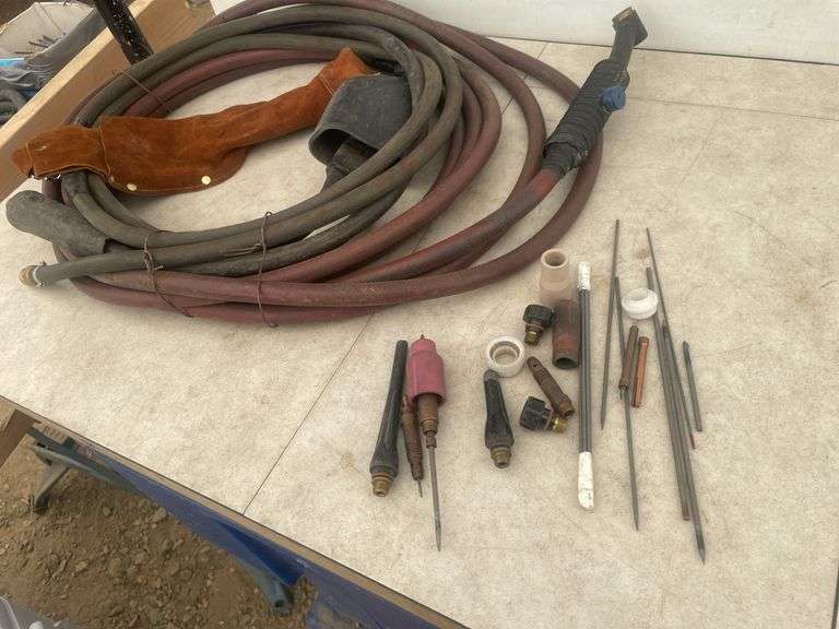 Tig torch parts and a leather welding jacket