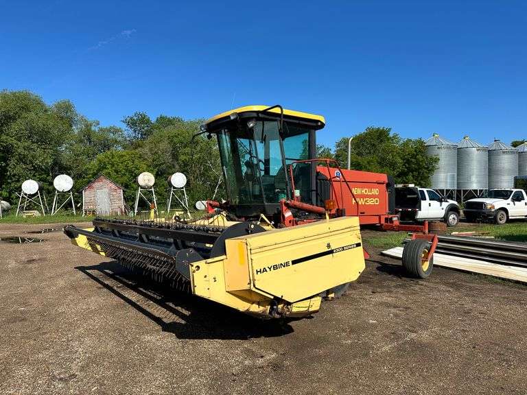 OFFSITE MELFORT: New Holland HW320 Haybine