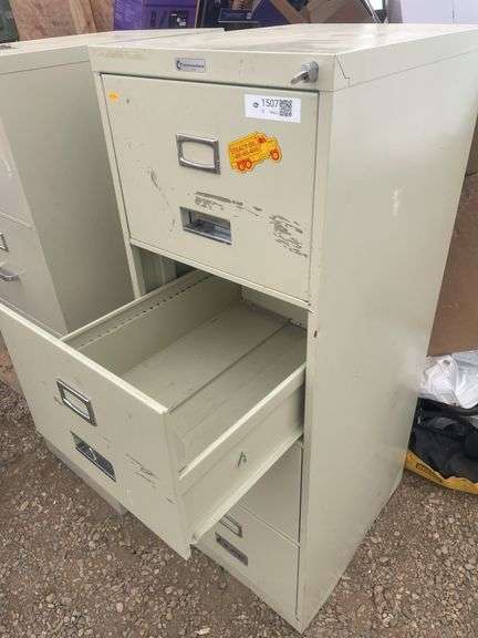 4 drawer filing cabinet with key