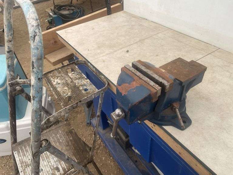 Step ladder and a 5" swivel base vice