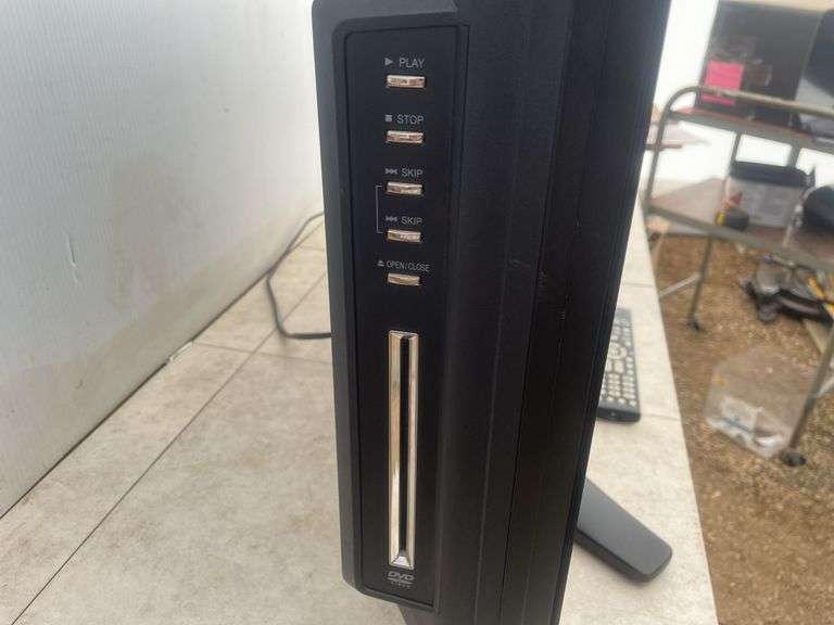 Toshiba 32" with remote has DVD built in - owners says works fine