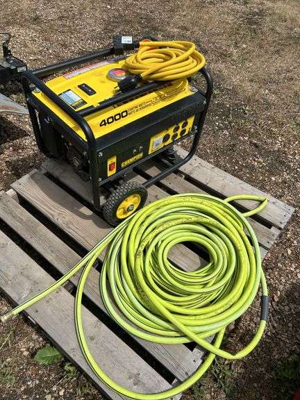 Champion 3000 generator c/w extension cord & garden hose - owner says runs