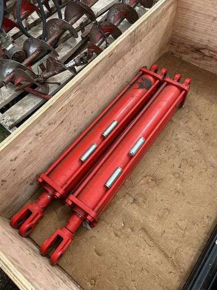 Pair of large UNUSED hydraulic cylinders