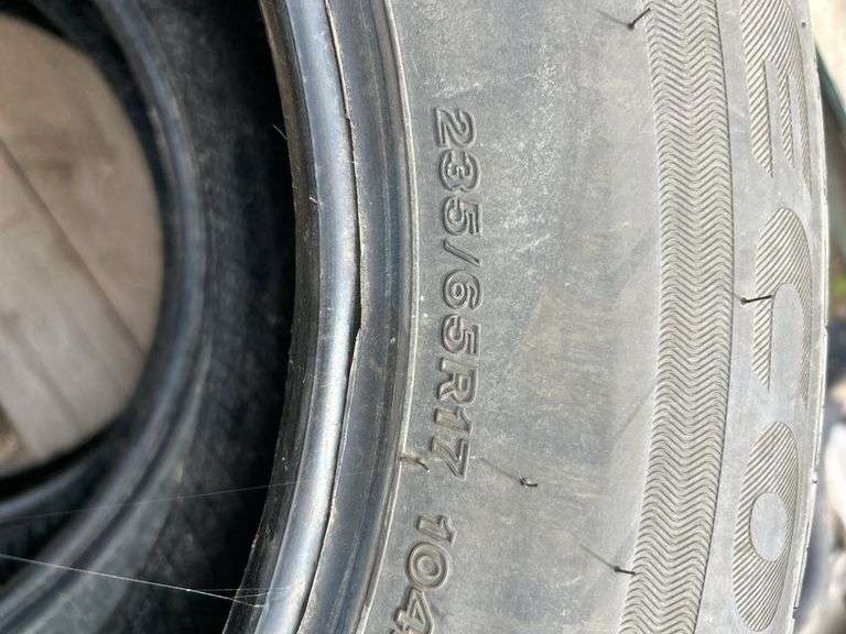 4 tires 235/65R17 - 3 Bridgestone, 1 Firestone