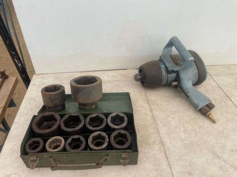 1" CP air impact and a quantity of impact sockets