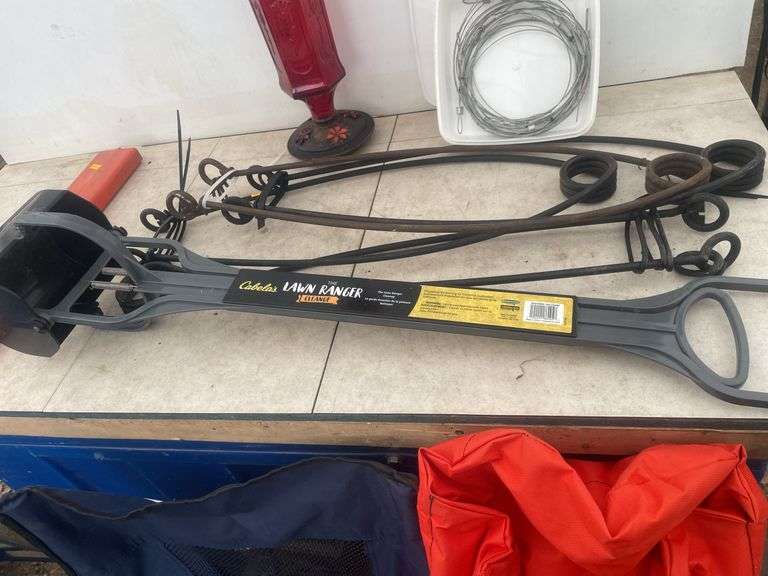 Coyote power rams, 2 foldable lawn chairs, hummingbird feeder, lawn ranger, etc.