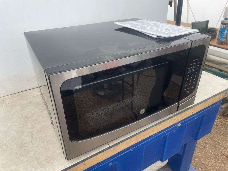 Unused - 1.6 cu. ft. GE Microwave, inverter technology, sensor cook, auto defrost, auto heat