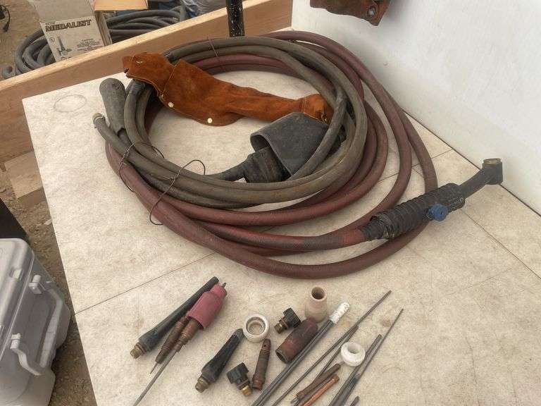Tig torch parts and a leather welding jacket