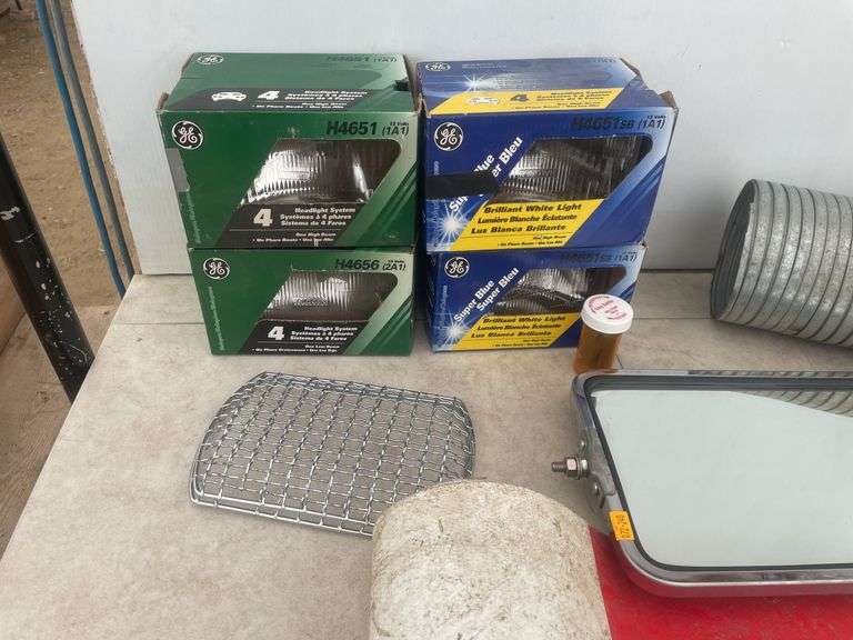 2 - 41/2" flood lights, wide load sign, headlights, truck mirror, etc
