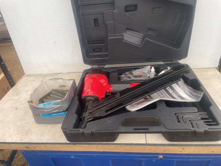 King Canada 28 degree clipped head framing nailer and a partial box of nails