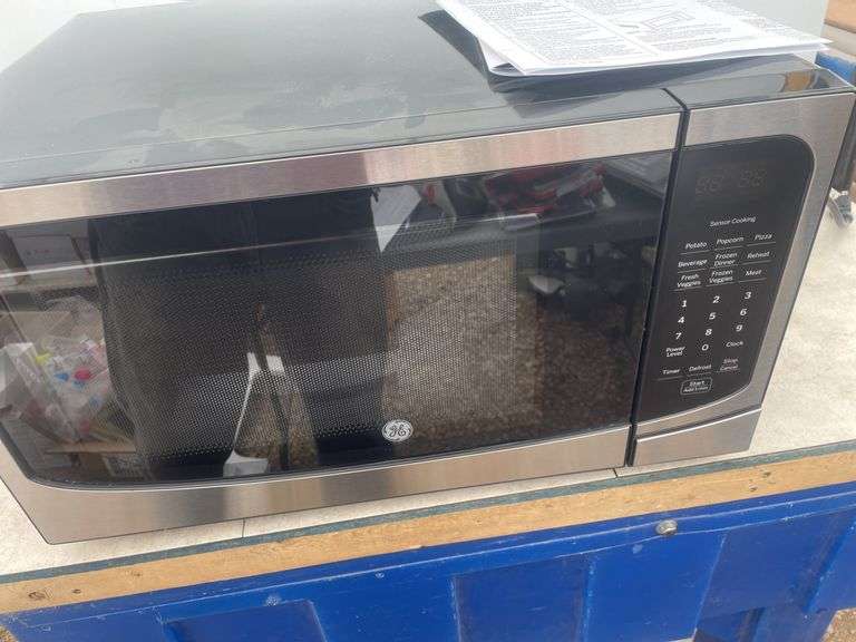 Unused - 1.6 cu. ft. GE Microwave, inverter technology, sensor cook, auto defrost, auto heat
