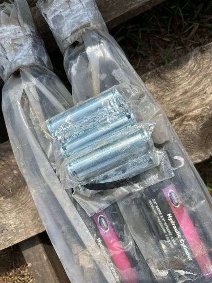 2 UNUSED 2”x8” black cylinders