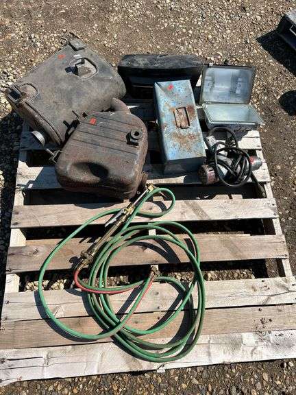 Pallet of misc, cutting torch, electric impact, mufflers etc