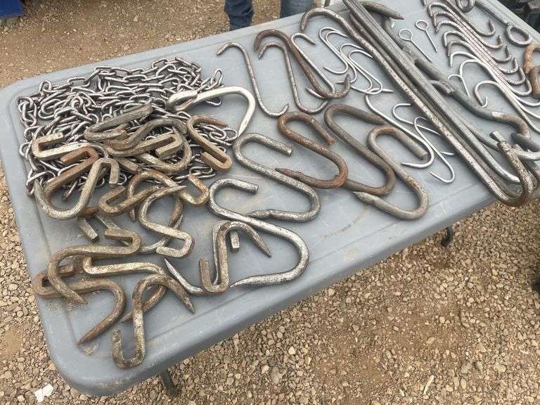 Quantity of meat hanging hooks and chains