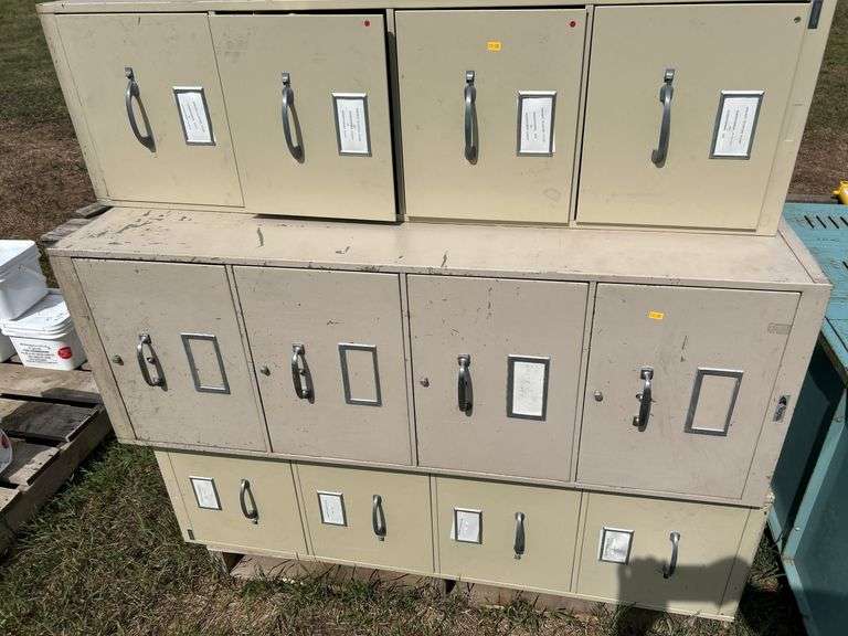 4 metal filing cabinets