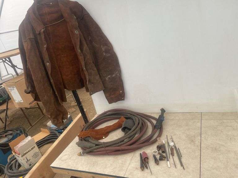 Tig torch parts and a leather welding jacket