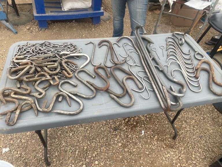 Quantity of meat hanging hooks and chains