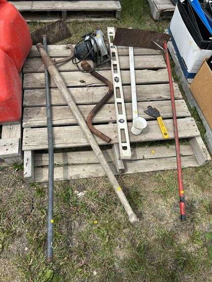 Pallet of misc skilsaw, grain box corner scoop, level etc