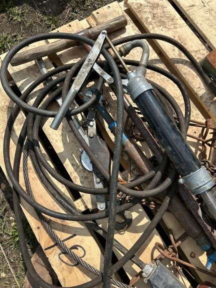 Pallet of misc, barrel, rusty bench drill press, trap etc