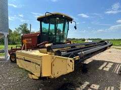 OFFSITE MELFORT: New Holland HW320 Haybine