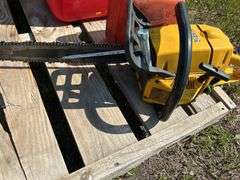 Pallet with gas cans, post maul, chainsaw - condition unknown