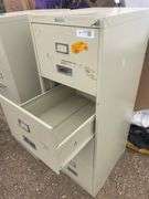 4 drawer filing cabinet with key