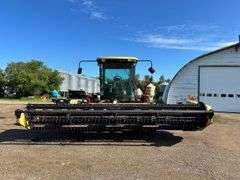 OFFSITE MELFORT: New Holland HW320 Haybine