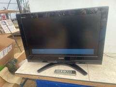Toshiba 32" with remote has DVD built in - owners says works fine