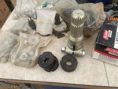 Quantity of misc tools, nuts and bolts, filters, pto adapter 540 to small 1000 etc.