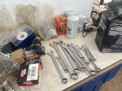 Quantity of misc tools, nuts and bolts, filters, pto adapter 540 to small 1000 etc.