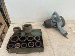 1" CP air impact and a quantity of impact sockets