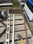 Pallet of misc skilsaw, grain box corner scoop, level etc