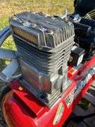 Coleman Powermate air compressor c/w hose - owner says works